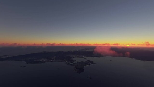 Aerial sunset drone view of Daniel K. Inouye International Airport in Honolulu - Hawaii. United States