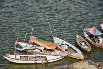 Obraz premium High angle view of boats on Ganges river in Varanasi, India