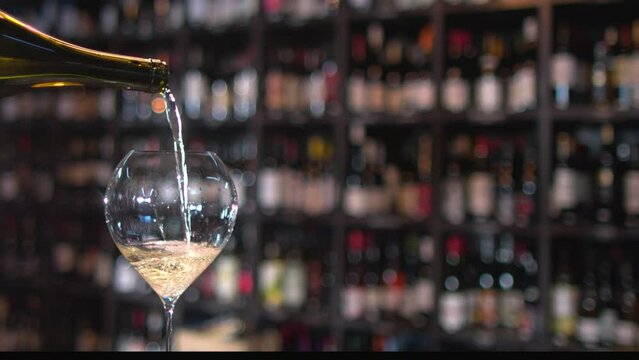 White wine poured in a glass