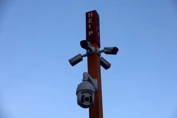 multi-angle CCTV with a rotating camera on a CCTV pole in urban areas, digital surveillance of citizen activities in urban areas.