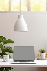 Laptop with blank screen on table in office. Mockup