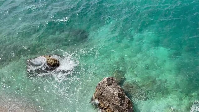 Rocky beach and crystal turquoise water of Ionian 