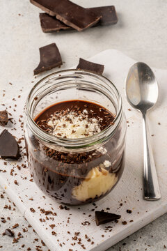 Supangle dessert. Spangle or chocolate pudding in jar on white  background