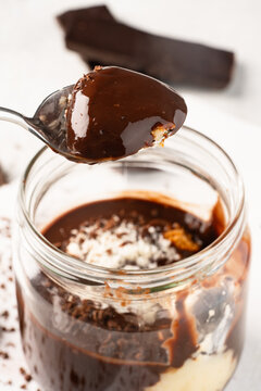 Supangle dessert. Spangle or chocolate pudding in jar on white  background
