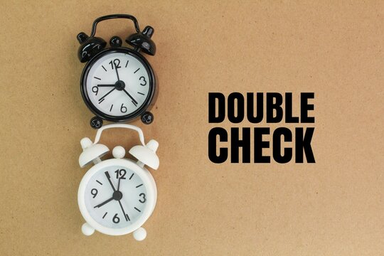 two bell hours with the word double check. the concept of double check or second check