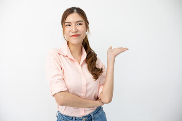 Presentation Concept: Asian Woman Demonstrating Gesture, Pointing to Space on White Background, Creative Expression of Ideas