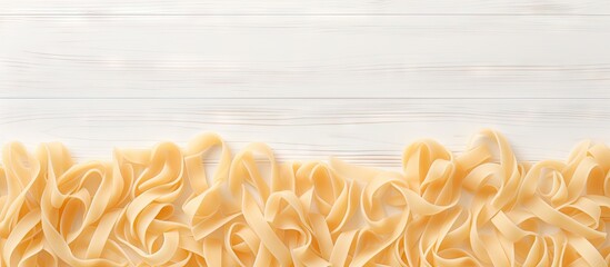 Close up view of a cluster of pasta on a white tabletop, creating a simple and appetizing pasta...
