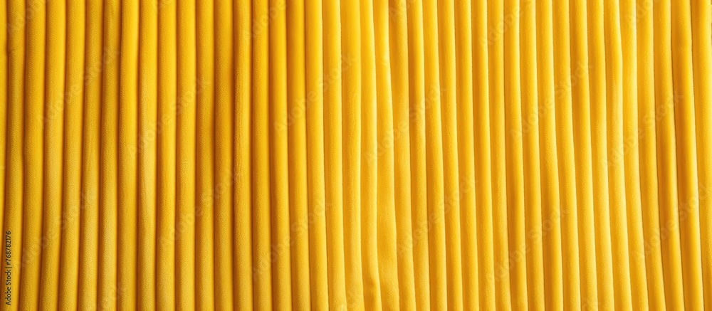 Aufkleber several yellow pleas are neatly arranged in a straight row on a textured wall background of yellow c