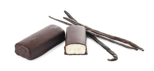 Glazed curd cheese bars and vanilla pods isolated on white