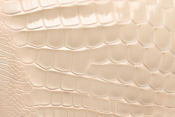 Light beige leather, background. Crocodile leather texture