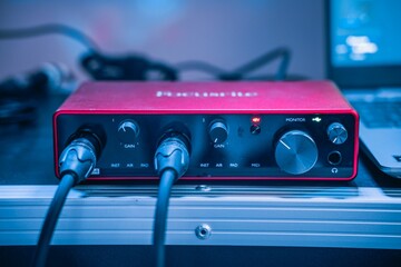 Closeup shot of the audio interface with 2 XLR cables.