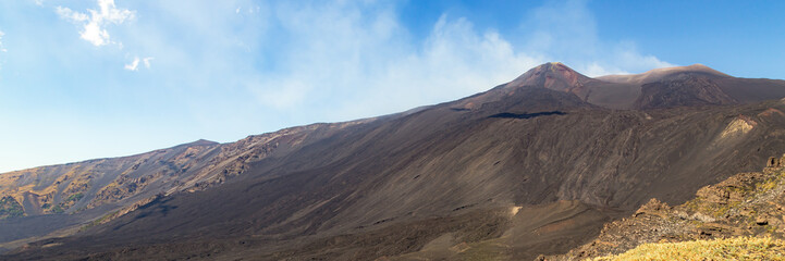 Fototapeta na wymiar Mount Etna in Italy, Sicily. Climb Etna volcano to the top. Banner Web with copy space.