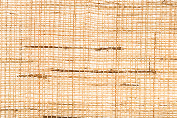 Natural loose plain linen fabric texture background, top view.