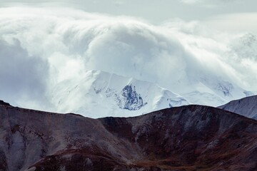 Landscape of a snowy mountain range in Alaska, the US