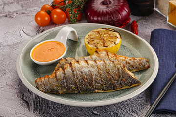 Grilled seabass fillet with lemon