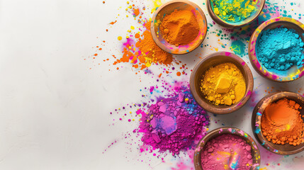 Obraz na płótnie Canvas Holi color festival vibrant colours powder in bowls, top view