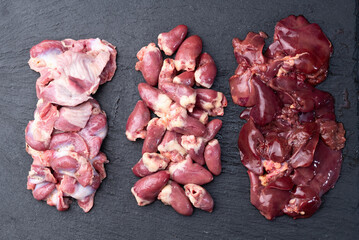 Raw chicken giblets raw poultry meat set : liver, stomach and heart - 768805593