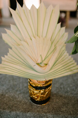 Decorating trees and leaves with small pots for traditional Javanese weddings