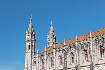 exterior architecture of The Jerónimos Monastery in Lisbon - 768811384