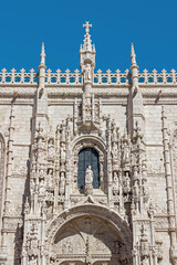 exterior architecture of The Jerónimos Monastery in Lisbon - 768811526