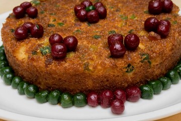 Brown Rava Cake in Plate, Cross View, Berry, Cherry, Tuti Futi, Very Close Up View