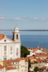 cityscape of old buildings with blue ocean at Lisbon viewpoint - 768821905