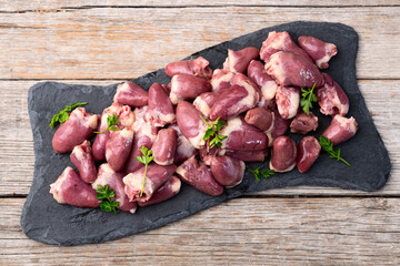 Raw chicken giblets hearts , meat background - 768827339