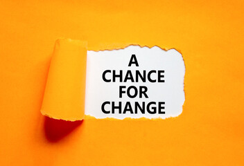 A chance for change symbol. Concept words A chance for change on beautiful white paper. Beautiful orange background. Business A chance for change concept. Copy space. - obrazy, fototapety, plakaty