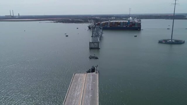 BALTIMORE, MD - 3.26.2024 - Aerial of the Francis Scott Key Bridge in Baltimore after being struck by the cargo ship Dali.