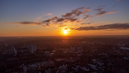 a large city skyline with some buildings in the foreground