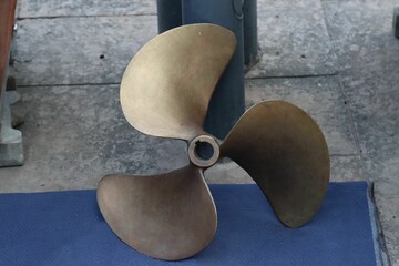Closeup of a large metal propeller