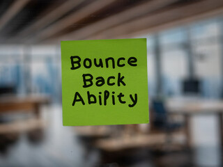 Post note on glass with 'Bounce Back Ability'.