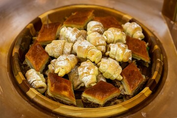 Closeup of a plate of fresh pastry for a banquet