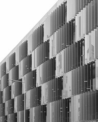 Grayscale shot of an abstract architectural building