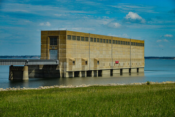 Garrison Dam  intake structure is used to transport water from lake Sakakawea to the hydroturbines in the power generating facility on the south side of dam through penstock tubes.