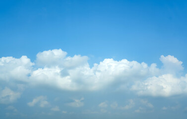 Naklejka na ściany i meble cumulus clouds and blue sky