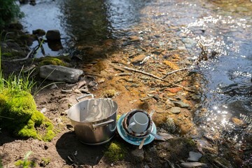 unwashed dishes outdoors