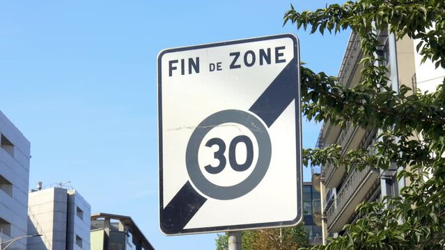 End of Zone 30 French road sign, indicating the limit zone of thirty kilometers per hour for cars and other vehicles in Paris, France