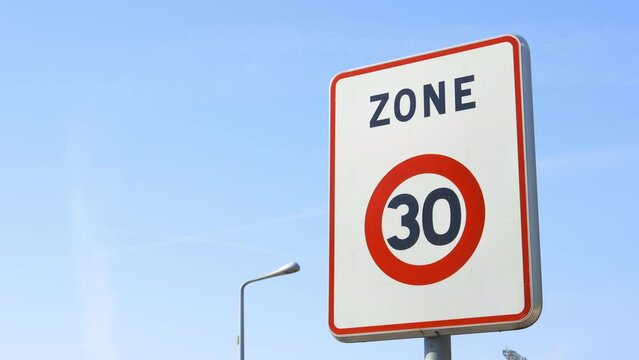 Zone 30 road sign, indicating the limit zone of thirty kilometers per hour for cars and other vehicles