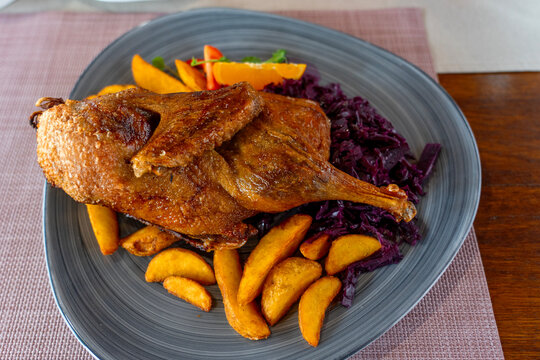 roasted half duck with red cabbage traditional hungarian dish