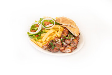 Greek Cypriot Pork Souvlaki - Pork Chopped into bite-sized chunks with salad and chips