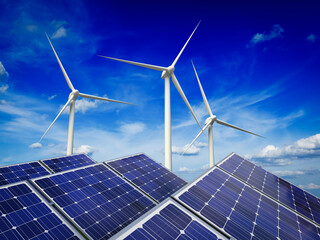 Green alternative energy and environment protection ecology concept - solar battery panels and wind generator turbines against blue sky - 768863172