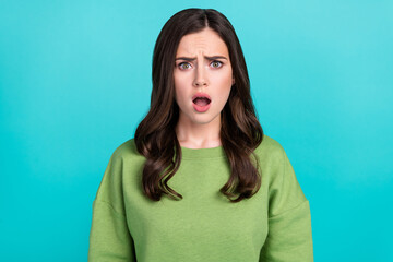 Fototapeta premium Photo of unsatisfied puzzled person open mouth staring speechless isolated on turquoise color background