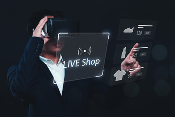 Businessman using VR Live shop ecommerce store concept, sales marketing selling products online on streaming platform, sales business person strategy using virtual reality headset with graphic icon.