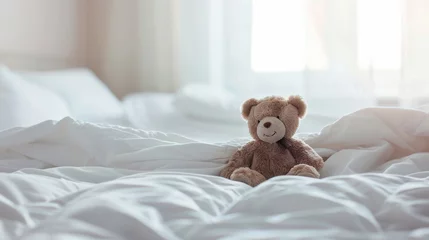 Fotobehang A cozy white bed with a single teddy bear, ready for a child's bedtime story © kamonrat
