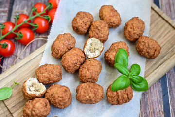 Home made Feta and Olives Stuffed Greek Meatballs .Greek confort food. Mediterranean diet 