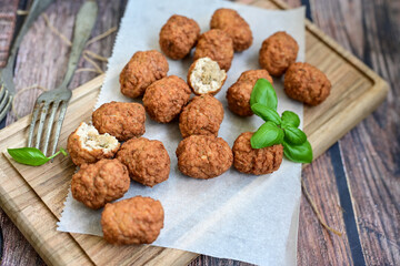 Home made Feta and Olives Stuffed Greek Meatballs .Greek confort food. Mediterranean diet 