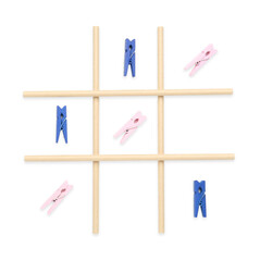 Tic tac toe game made with clothespins isolated on white, top view