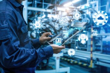 Industry engineer in factory using smart tablet device to control networking for auto industry. Smart industry 4.0 technology concept