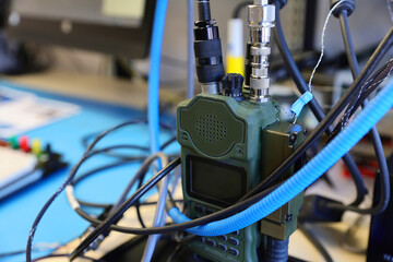 Close up of military portable radio station installed on an armored vehicle.